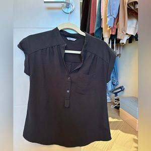 Naked Zebra black button down short-sleeved blouse. Size small.